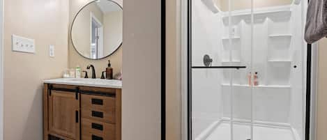 Shower, towels, soap, toilet paper