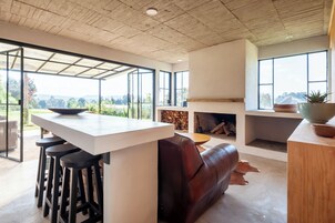 Comfort House, Garden View | Living area | Fireplace