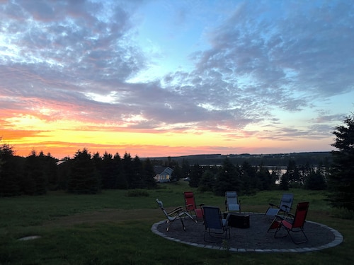 Peaceful river view cottage close to world class sandy beaches