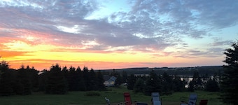 Peaceful river view cottage close to world class sandy beaches