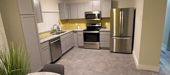 4bedroom house with upstairs outdoor patio,WiFi and in peaceful Woodlands area.