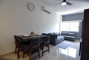 Basic Apartment, 1 Queen Bed, Kitchen | Living area | 40-inch LED TV with digital channels - CasMar - 3 (Puerto Vallarta)