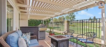 Golf course views abound in this picturesque Shadowridge Cottages home,