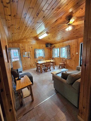 Standard Cottage, 3 Bedrooms, Partial Lake View | Living area | 32-inch flat-screen TV with cable channels