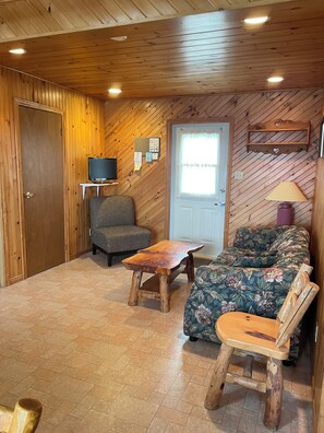 Premium Cottage, 3 Bedrooms, Lake View | Living area | 32-inch flat-screen TV with cable channels
