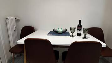 Apartment, City View | Living area | 32-inch flat-screen TV with digital channels