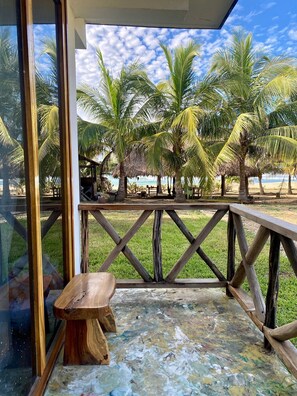 Quarto standard, vista para o mar | Terraço/pátio