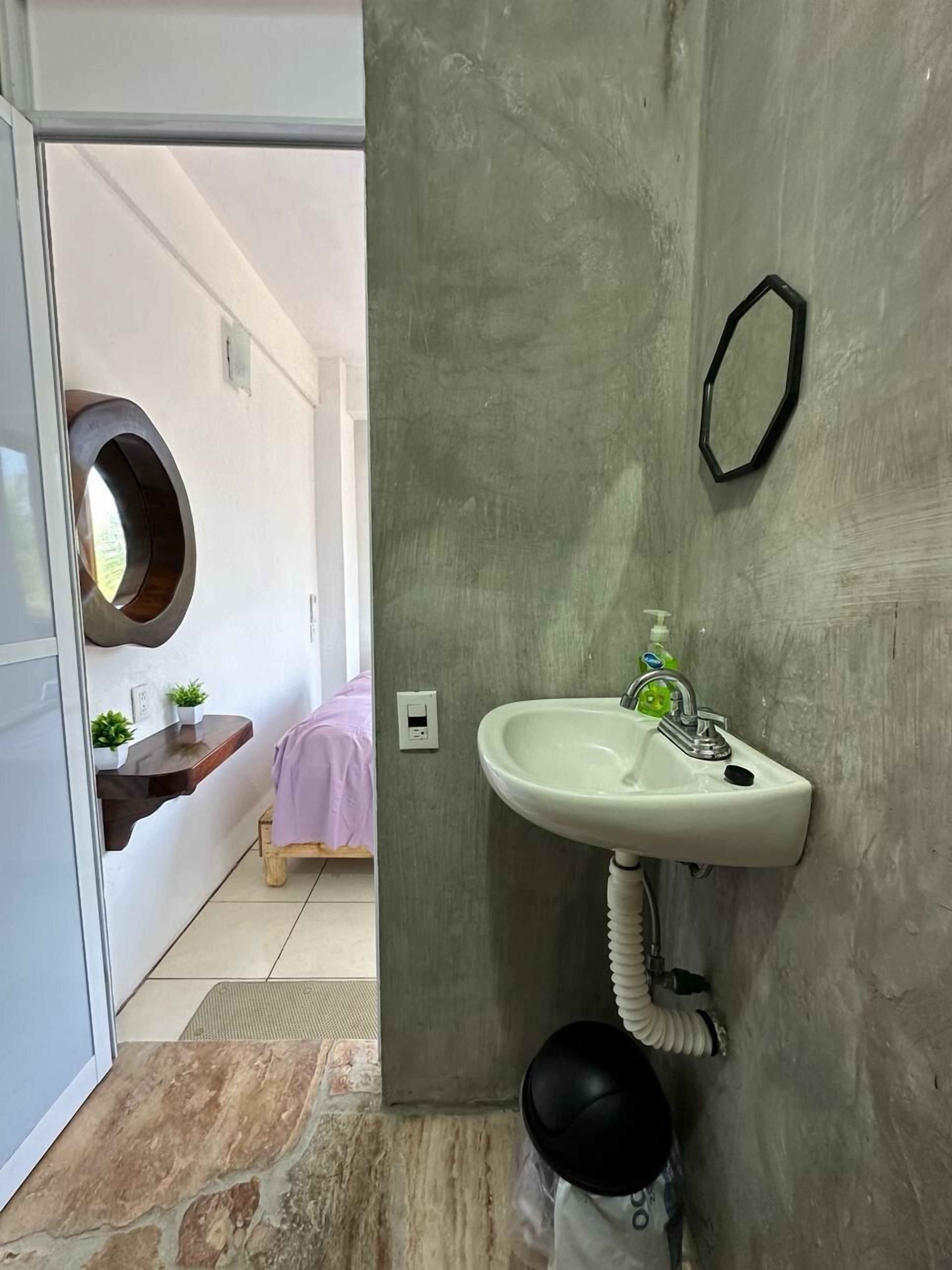 Standard Room, Beach View | Bathroom | Shower, free toiletries, towels, soap