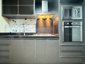 Fridge, microwave, oven, cookware/dishes/utensils