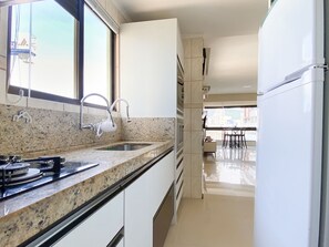 Fridge, microwave, oven, cookware/dishes/utensils