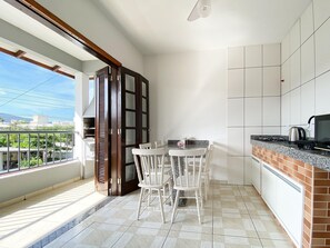 Enjoy meals in this kitchen with an oven, microwave, and dining area.