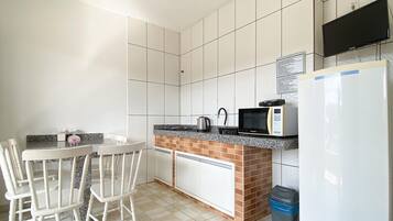 Fridge, toaster, cookware/dishes/utensils