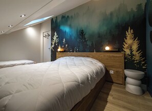 1 habitación, tabla de planchar con plancha, cuna de viaje y wifi