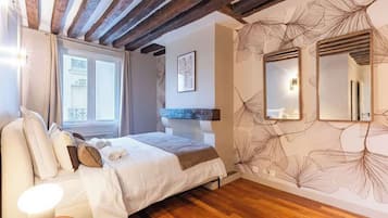 3 habitaciones, tabla de planchar con plancha, wifi y ropa de cama