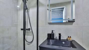 Shower, hair dryer, shampoo