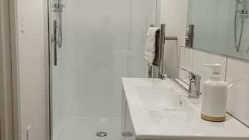 Hair dryer, towels, soap, shampoo