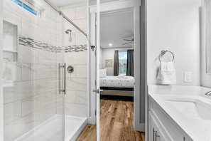 Shower, hair dryer, towels