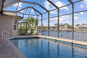 Pool - Canal-Side Paradise: Spacious Cape Coral Retreat with Stunning Water Views (Cape Coral)