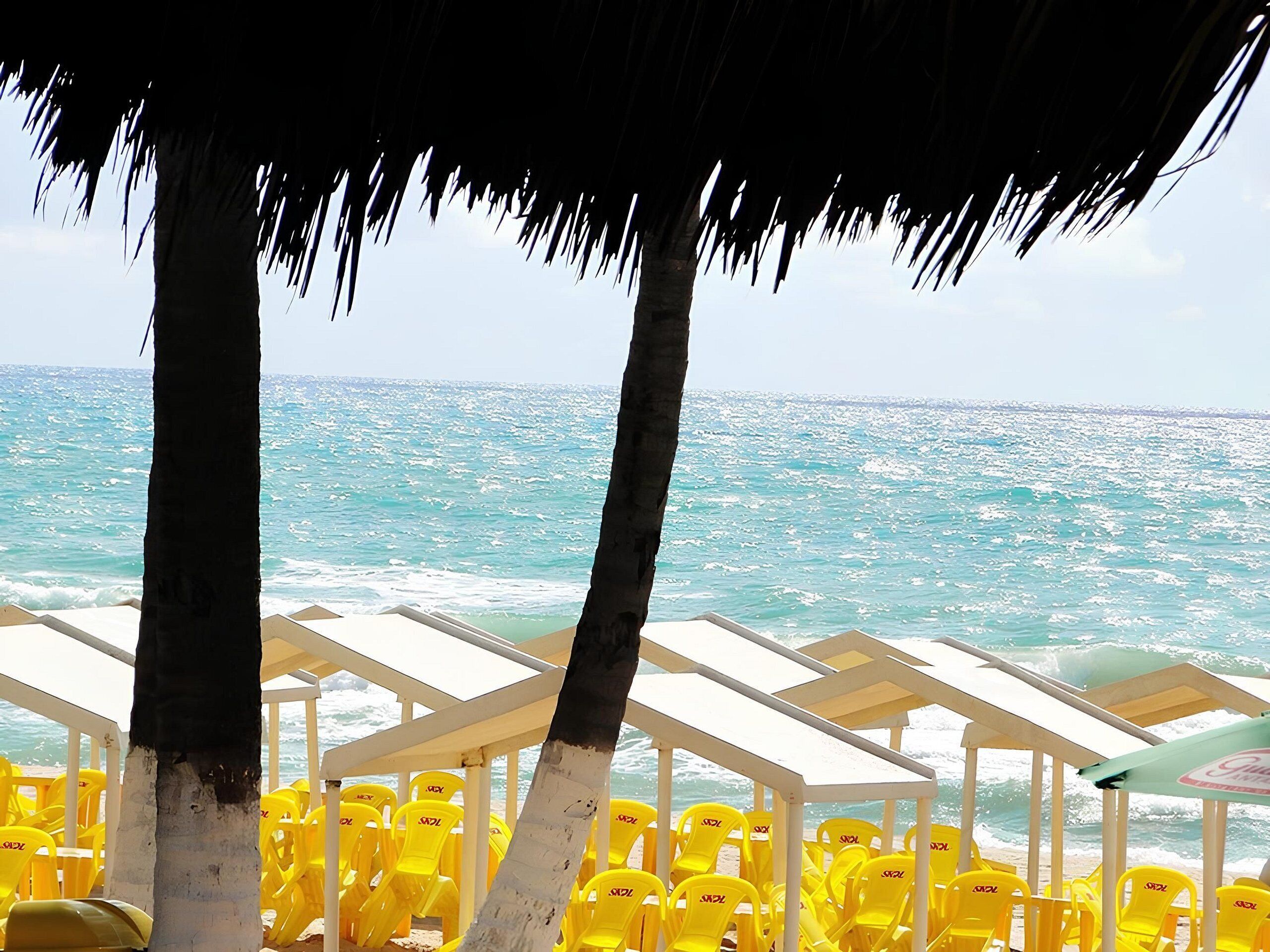 On the beach, white sand, 20 beach bars