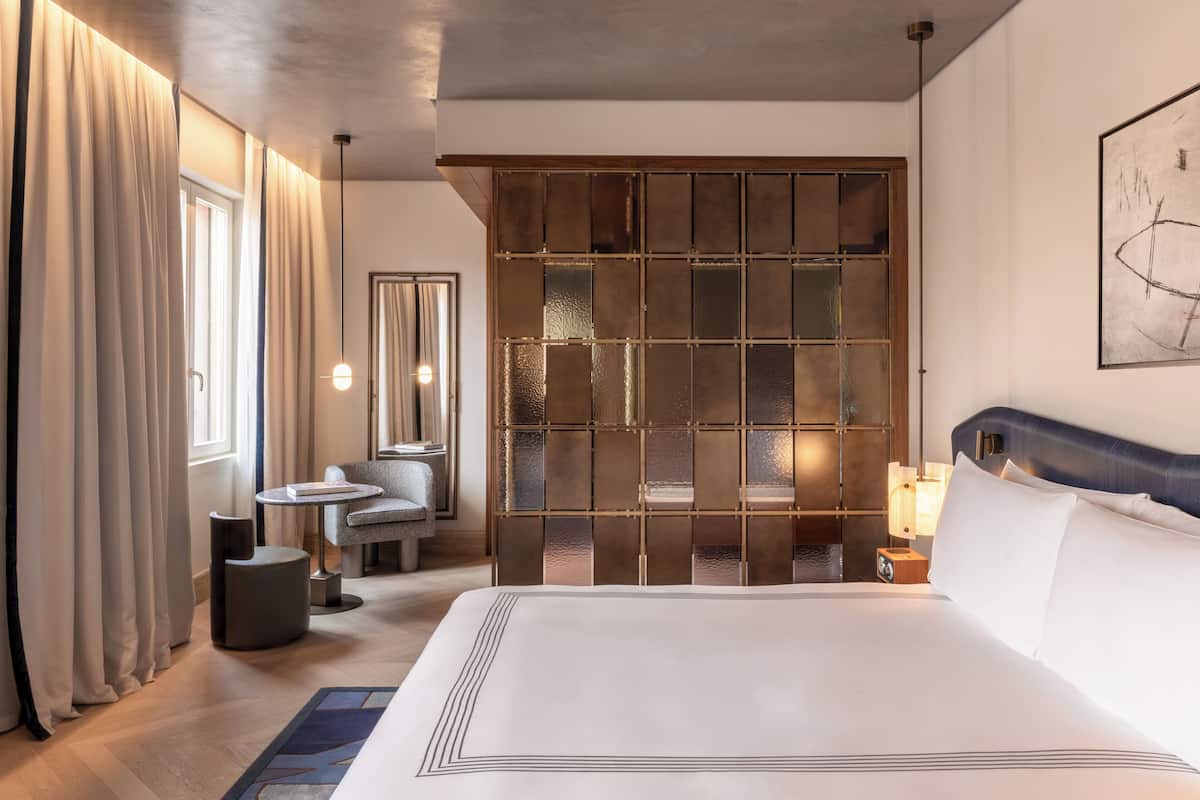 Premium bedding, down comforters, pillowtop beds, minibar
