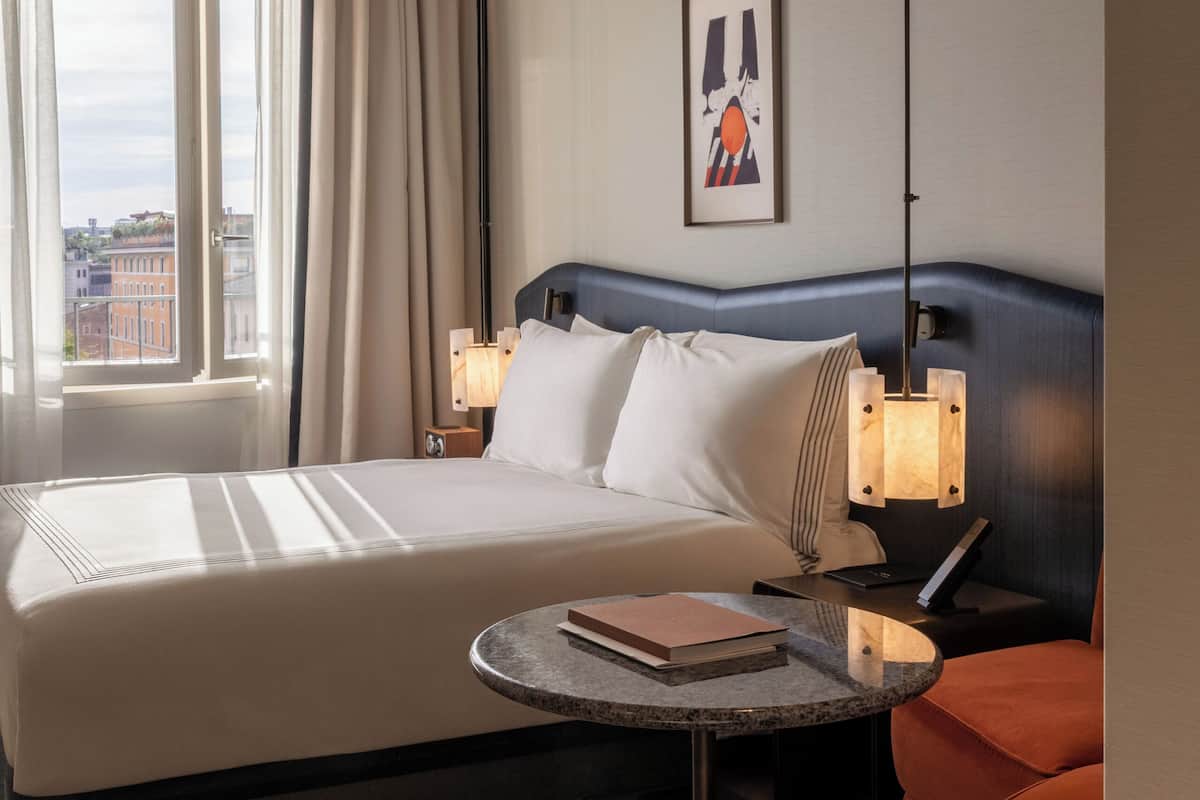 Premium bedding, down comforters, pillowtop beds, minibar