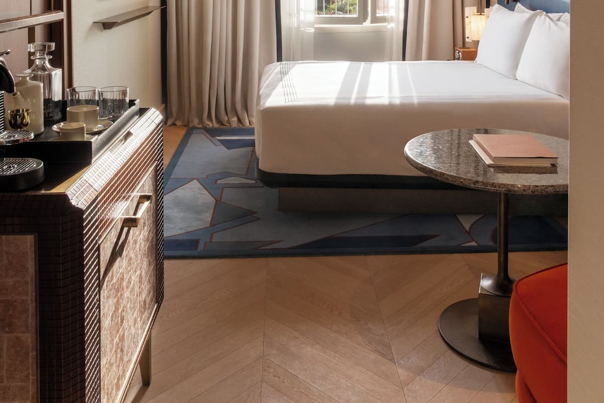 Premium bedding, down comforters, pillowtop beds, minibar