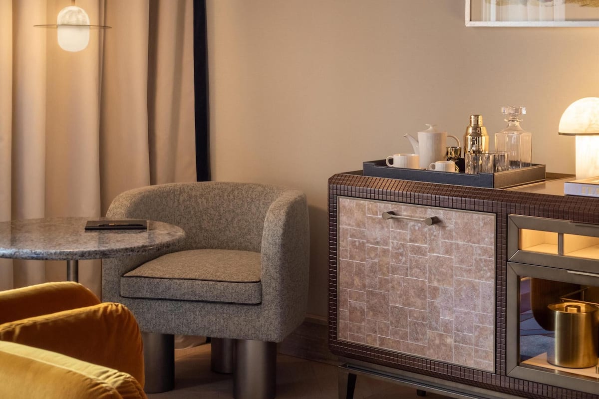 Premium bedding, down comforters, pillowtop beds, minibar