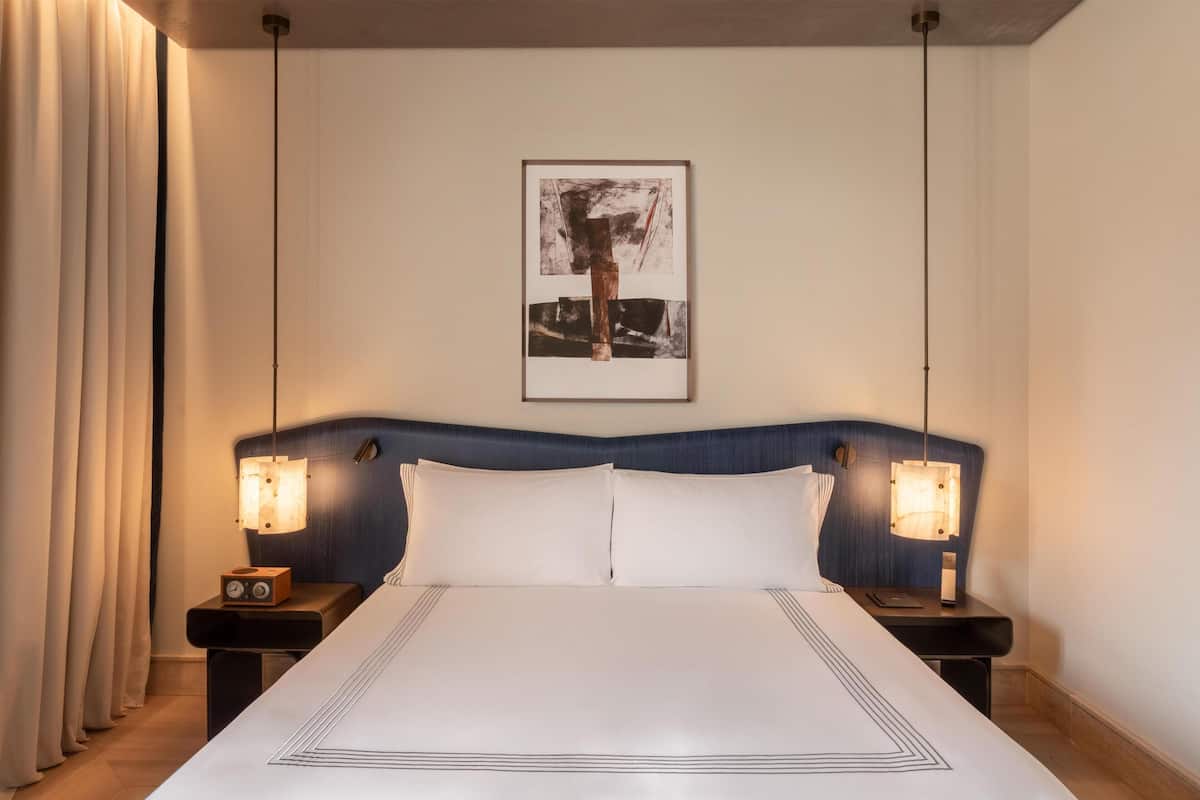 Premium bedding, down comforters, pillowtop beds, minibar