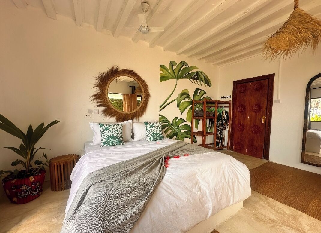 Deluxe Triple Room, Beach View | In-room safe, individually decorated, individually furnished, free WiFi