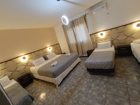 Cubrecamas, sistema de insonorización, wifi gratis y ropa de cama