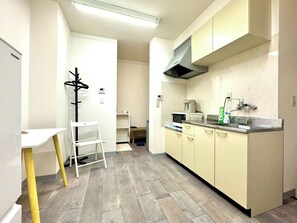 Fridge, microwave, cookware/dishes/utensils