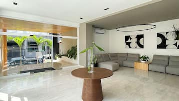 Comfort Condo, Multiple Beds, Private Bathroom, City View | Living area