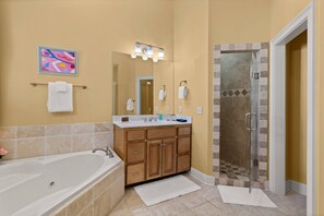 Shower, jetted tub, hair dryer, towels - Pet Friendly | Spacious Kitchen | Wine Fridge | Garage | Decks | Bonus Room | Fenced Backyard (St. Simons Island)