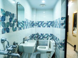 Family Room | Bathroom | Slippers - Sun High Stay Luxury Guest House (Varanasi)