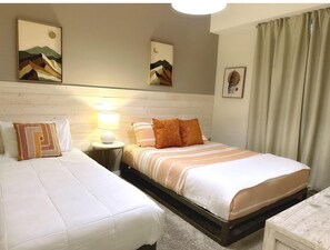 2 bedrooms, desk, iron/ironing board, travel cot