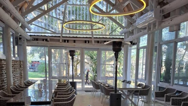 A spacious indoor area with high ceilings, large windows, and modern lighting fixtures. - Le.Alley Autocamp Resort (Zhuolan)