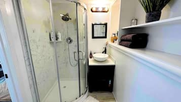 Hair dryer, towels, soap, shampoo