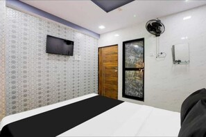 Classic Room | Free WiFi, bed sheets - Hotel Delight In By GRB (Surat)