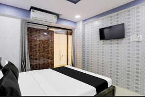 Classic Room | Free WiFi, bed sheets - Hotel Delight In By GRB (Surat)