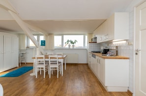 Appartement | Cuisine privée | Chaise haute