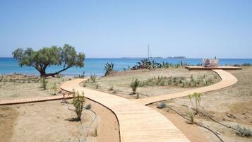 Beach nearby, sun loungers