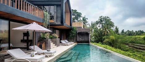 Outdoor pool, pool umbrellas, pool loungers