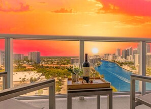 Outdoor dining - Urban Apartment Balcony & Pool (Hallandale Beach)
