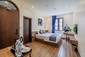 Family Quadruple Room, City View | Desk, laptop workspace, soundproofing, free WiFi