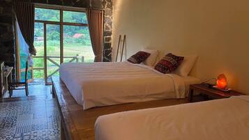 Chambre Deluxe Double ou avec lits jumeaux, vue colline | Coin séjour