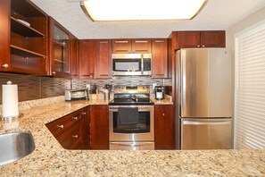 Fridge, microwave, oven, stovetop - Tradewinds Condominiums 161 (St. Augustine)