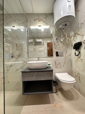 Superior Room, City View | Bathroom | Hair dryer, slippers, towels, soap - LUXE HAVEN RESIDENCY (Budgam)
