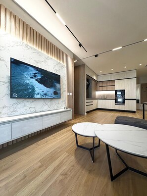 Two-Bedroom Apartment with Balcony | Living area | 32-inch flat-screen TV with cable channels - Blue Boutique Apartments 1 (Farke)