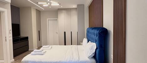 Departamento Deluxe, 2 habitaciones | 3 habitaciones, escritorio y espacio para trabajar con laptop