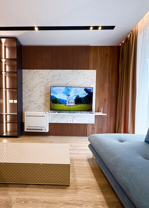 Apartment, Balcony | Living area | 32-inch flat-screen TV with cable channels - Blue Boutique Apartments 1 (Farke)